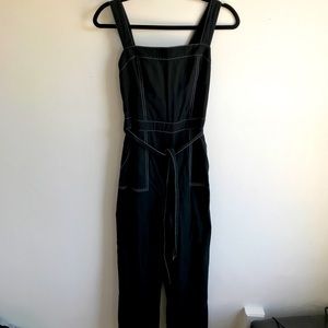 Urban Outfitters black jumpsuit with white stitching